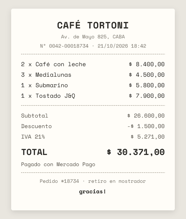 Ticket for Café Tortoni: four items, discount, 21% IVA and total, paid with Mercado Pago